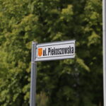 Ulica Piekoszowska znak drogowy Znak drogowy z nazwą ulicy